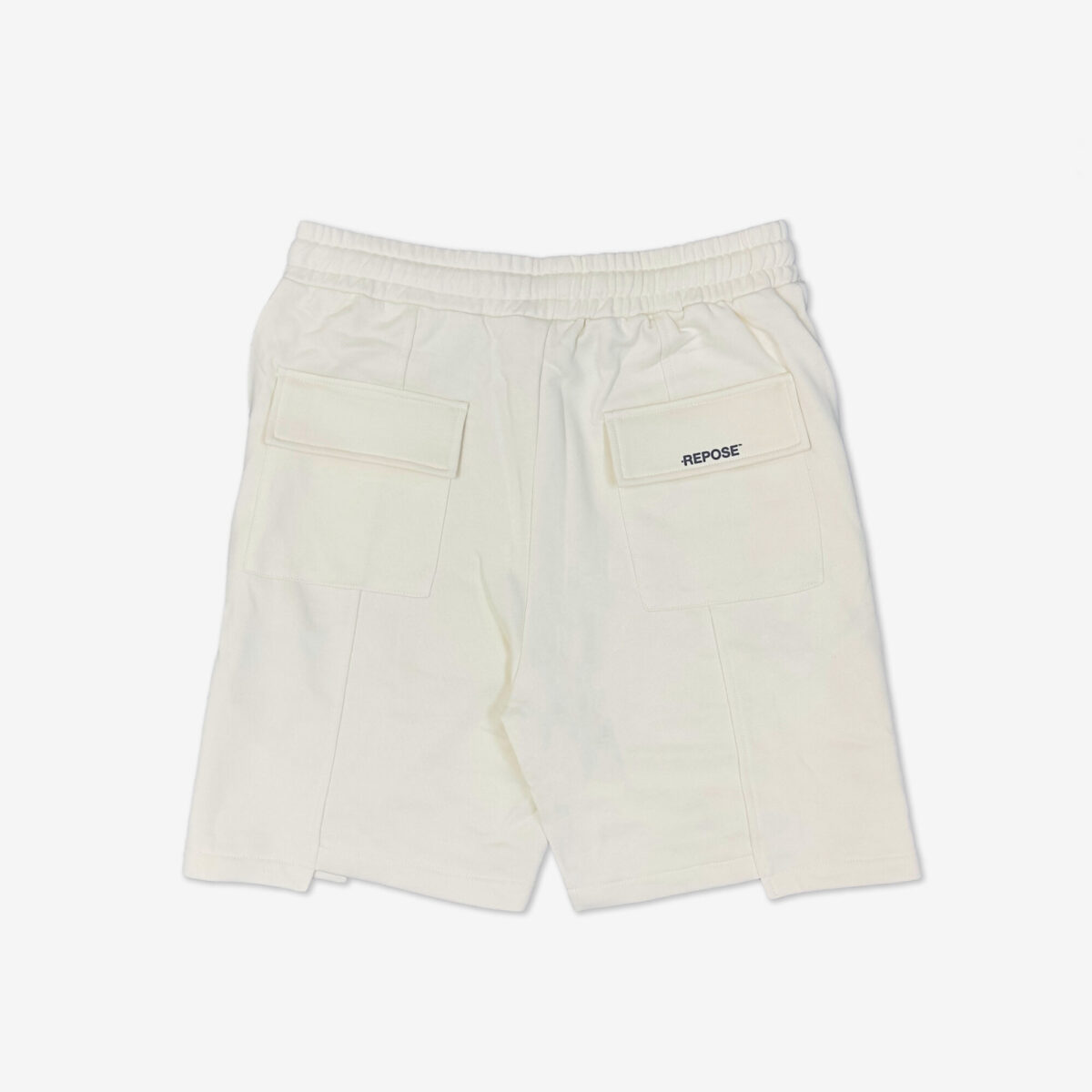 REPOSE Uneven Cut Cream Shorts
