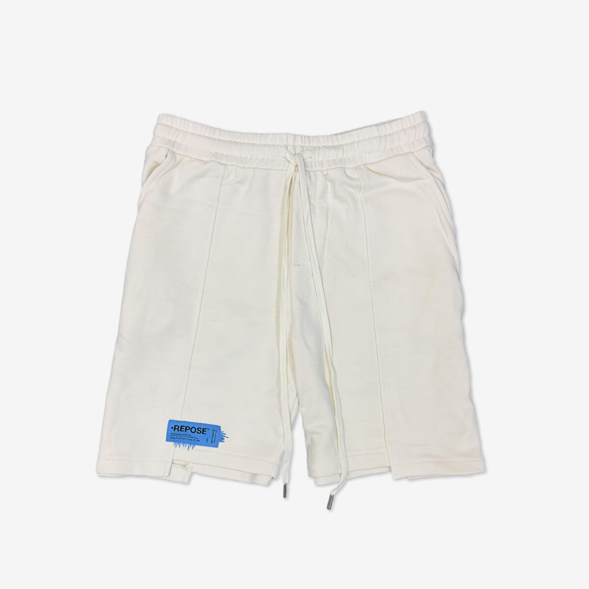 REPOSE Uneven Cut Cream Shorts