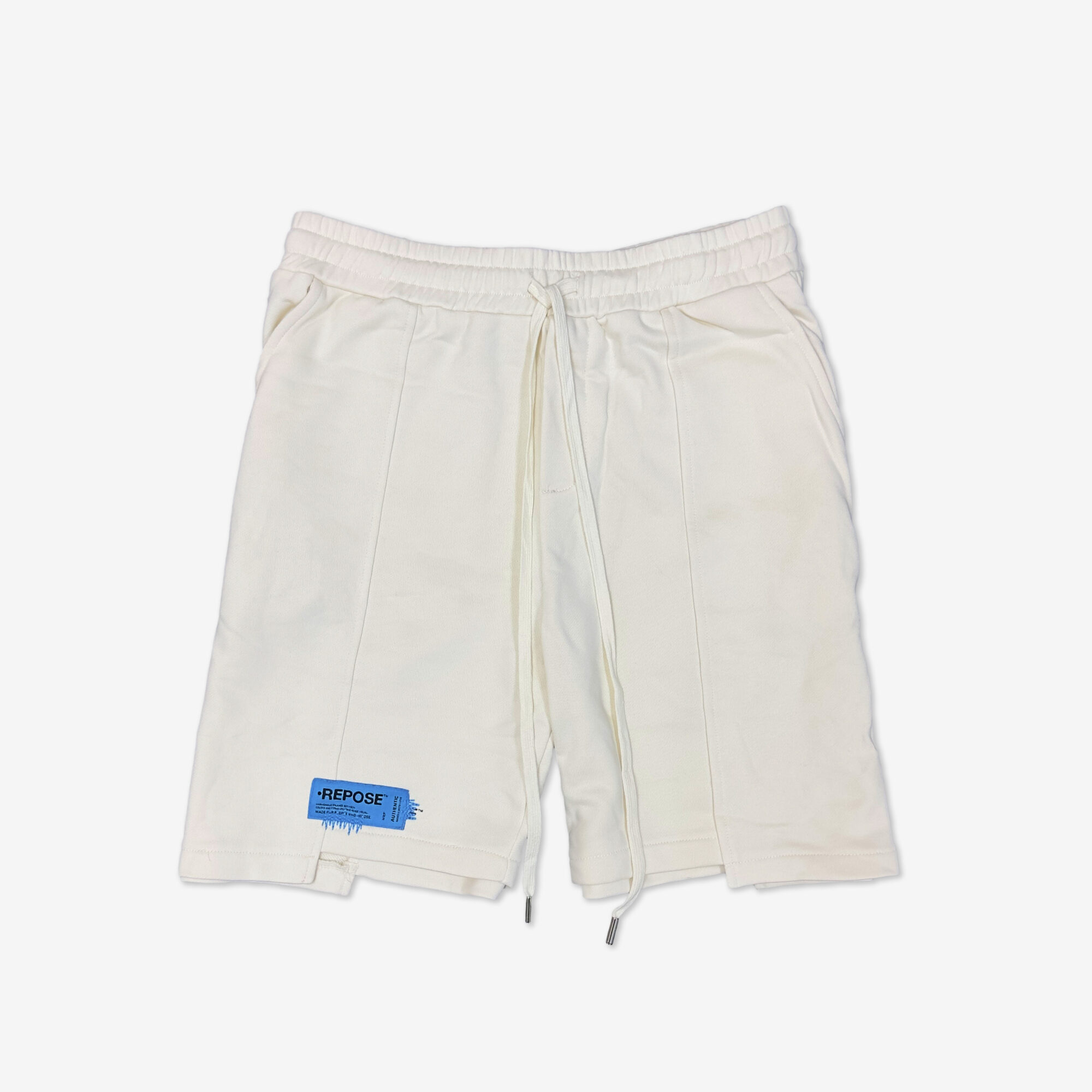 REPOSE Uneven Cut Cream Shorts